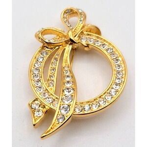 Vintage Nolan Miller Glamour Collection Bow On Circle Pin Gold Tone Signed